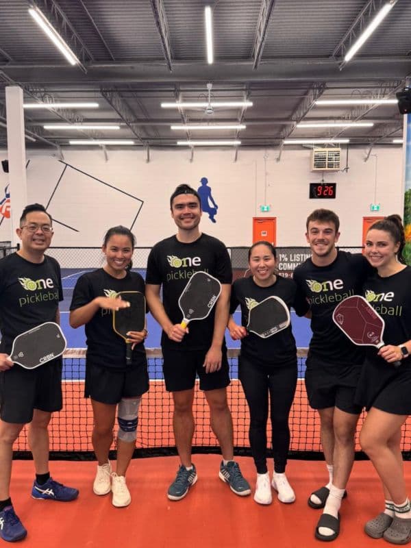 A Klyng Cup team with their paddles before a match